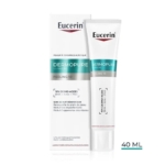 Un tube et un coffret d'Eucerin Dermopure K10 Soin Rénovateur Cutané Peaux à Imperfections 40 ml, destiné aux peaux sujettes aux imperfections, dans un emballage blanc rehaussé de touches de bleu sarcelle et comportant les informations sur le produit en français sur le devant. Dakar