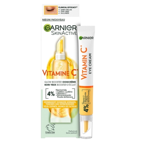 Un tube de Garnier Vitamine C Crème Contour des Yeux Éclaircissante 15 ml est présenté à côté de sa boîte, contenant 4 % de niacinamide et de vitamine C pour cibler les cernes et illuminer visiblement les yeux fatigués. Dakar