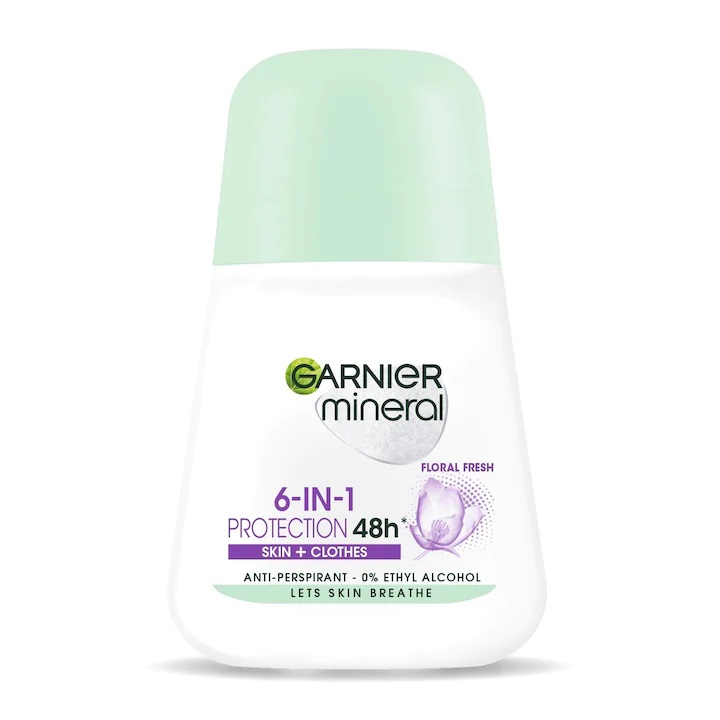 Le flacon de 50 ml du Déodorant Minéral Roll-On 6 en 1 Protection de Garnier offre une protection de 48 heures pour la peau et les vêtements, avec un corps blanc, un bouchon vert clair et un texte violet. Dakar