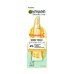 Un tube de 15 ml de Garnier Vitamine C Crème Contour des Yeux Éclaircissante dont l'emballage met en avant la niacinamide, la poudre de banane et les bénéfices tels que la réduction des cernes et des signes de fatigue. Dakar