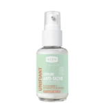 Un flacon transparent avec une pompe blanche contient le produit « Waam Sel Rose de l'Himalaya Bain et Gommage 500 g ». L'étiquette, en français, vante les bienfaits de la vitamine C et de l'extrait de busserole. Son design est simple avec des accents verts et rouges. Dakar