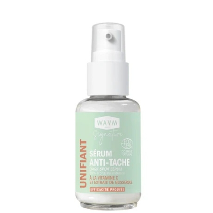 Un flacon transparent avec une pompe blanche contient le produit « Waam Sel Rose de l'Himalaya Bain et Gommage 500 g ». L'étiquette, en français, vante les bienfaits de la vitamine C et de l'extrait de busserole. Son design est simple avec des accents verts et rouges. Dakar