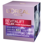Une boîte de L'Oréal Revitalift Filler Soin Jour Revolumisant Intense Anti-âge 50 ml dans un emballage violet avec un texte doré met en valeur ses bénéfices anti-âge et volumateurs pour aider à réduire l'apparence des rides. Dakar