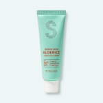 Le tube vert menthe de Tommee Tippee Kit de Naissance Mixte Starter Closer to Nature à partir de 0 Mois présente un bouchon blanc et des détails sur le produit en texte blanc et orange sur un fond clair. Dakar