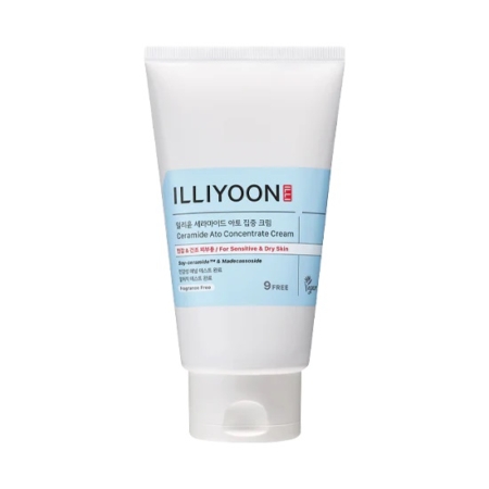 Le tube blanc d'Illiyoon Crème concentrée à la Céramide Peau Sensible à Sèche 230 ml avec une étiquette bleue hydrate les peaux sensibles et sèches. L'emballage comporte des textes en anglais et en coréen, ainsi qu'un bouchon blanc à charnière. Dakar