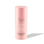 Un flacon rose de « Byphasse Lait Hydratant Illuminateur Effet Glow Visage » de 150 ml est posé à la verticale sur un fond blanc, projetant une ombre grise et douce. Dakar