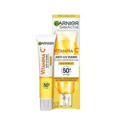 Garnier Skin Active Fluide Invisible Anti Taches à la Vitamine C SPF50+ 40 ml se présente sous la forme d'un tube blanc et jaune avec une boîte, met l'accent sur la protection solaire et la réduction des taches brunes, et porte la mention "Invisible" sur l'emballage. Dakar