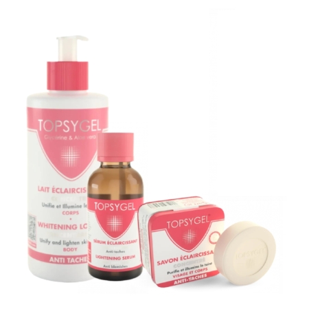 HT26 Gamme Topsigel Unifiant Et Illuminatrice + Huile Réparatrice 225ml offert : Un coffret de soins comprenant des produits éclaircissants dans un emballage essentiellement blanc avec des accents roses, y compris une lotion, un sérum et un savon éclaircissant en boîte avec le savon rond visible. Dakar