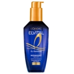 Un flacon pompe bleu et or de L'Oréal Paris Elvital Huile Magique Sérum Midnight 100 ml pour cheveux secs, montré à la verticale avec le nom du produit et les détails d'Elvital visibles sur l'étiquette avant. Dakar