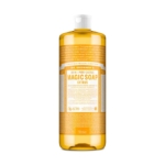 Une bouteille de 35g de Savon Naturel Pur Agrumes Orange de Dr Bronner avec un liquide jaune-orange et une étiquette orange et blanche affichant les détails du produit. Dakar
