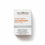 Une boîte de Dr Marie Diallo Laboratoires Savon Antiseptique Argile Rose et Huile Essentielles de Thym 150 g. L'étui blanc au texte or et gris met en valeur ses propriétés purifiantes, revitalisantes et antiseptiques. Dakar