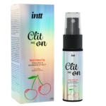 Un flacon d'INTT Spray excitant clitoris Clit me On menthe 12 ml, avec un effet de picotement et de réchauffement, est présenté à côté de sa boîte irisée avec des illustrations de menthe et une description de l'arôme de menthe. Dakar