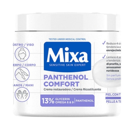 Pot blanc de Mixa Crème Panthénol Confort Visage Corps Mains 400 ml avec étiquette bleue, indiquant l'utilisation pour le visage, le corps et les mains, ainsi que les ingrédients mis en évidence : 13 % de glycérine, oméga 6 et 9, panthénol. Le texte apparaît en espagnol et en italien. Dakar