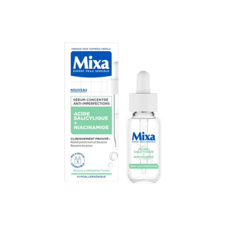 Une boîte de 30 ml de Mixa Sérum Concentré Anti Imperfections Acide Salicylique + Niacinamide et un flacon compte-gouttes transparent pour peaux sensibles, dans les tons bleu, vert et blanc, sont présentés côte à côte sur un fond blanc. Dakar