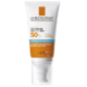 La Roche-Posay Anthelios UVMUNE 400 Ultra - Crème SPF50+ AVEC Parfum 50 ml se présente dans un tube blanc rehaussé de touches d'orange et de bleu. L'emballage met en valeur la mention "Crème Hydratante", qui offre une protection supérieure contre les rayons UVA ultra-longs. Dakar