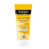Un tube de 75 ml de NEUTROGENA Curcuma Soins Hydratant Visage arbore un design jaune et blanc inspiré de la culture dynamique de Dakar. Le texte allemand le décrit comme un hydratant infusé de curcuma parfait pour les peaux impures et sensibles, et l'emballage précise également qu'il est sans huile. Dakar