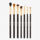 Découvrez le Set de pinceaux Smokey Eye Essential - 7 pièces de BH Cosmetics. Cette collection de sept pinceaux de maquillage est dotée de manches noirs élégants associés à de luxueuses viroles dorées, capturant l'essence sophistiquée de Dakar. Chaque pinceau est disponible dans différentes formes et tailles, idéales pour une gamme d'applications de maquillage. L'ensemble est présenté sur un fond blanc uni, soulignant son élégance. Dakar