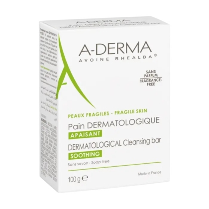 L'emballage blanc d'A Derma Les Indispensables Pain Dermatologique Apaisant 100g le présente comme un pain de savon sans parfum pour peaux sensibles, avec un texte vert et noir. Il offre un soin apaisant et illustre le savoir-faire français. Dakar
