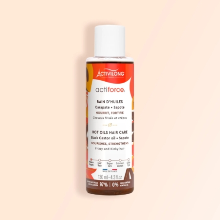 Un flacon d'Activilong Actiforce Bain d'Huiles 150 ml, pour cheveux crépus et frisés, est présenté sur un fond pêche clair. Dakar