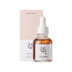 Flacon compte-gouttes de Beauty Of Joseon Sérum Revive Ginseng + Mucine d'Escargot 30 ml devant sa boîte sur fond blanc