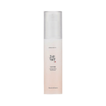 Un flacon de Beauté de Joseon Sérum Solaire Hydratant au Ginseng Spf50+ 50 ml avec un bouchon blanc et un texte coréen sur l'étiquette