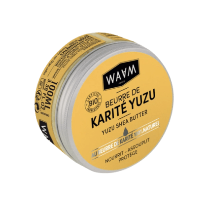 Un contenant rond de Waam Beurre de Karité Yuzu Corps