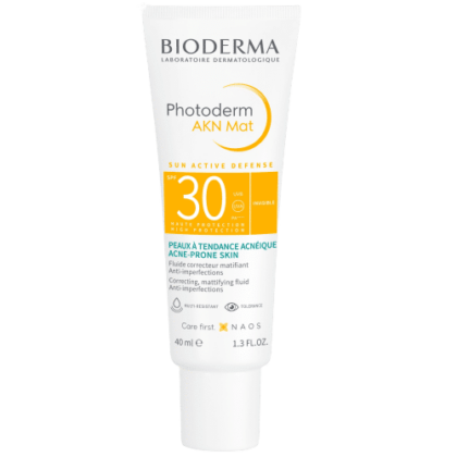 Découvrez le tube de 40 ml de Bioderma PHOTODERM AKN Mat Fluide Solaire Correcteur Matifiant SPF 30, spécialement conçu pour les peaux à tendance acnéique sous le soleil intense de Dakar. Le packaging majoritairement blanc arbore un design distinctif jaune et bleu canard, soulignant ses propriétés de protection solaire et anti-imperfections. Dakar