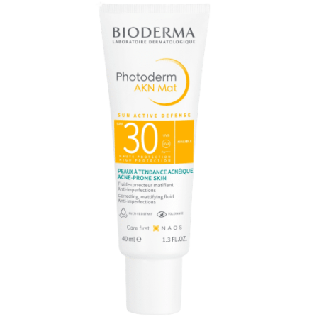 Découvrez le tube de 40 ml de Bioderma PHOTODERM AKN Mat Fluide Solaire Correcteur Matifiant SPF 30, spécialement conçu pour les peaux à tendance acnéique sous le soleil intense de Dakar. Le packaging majoritairement blanc arbore un design distinctif jaune et bleu canard, soulignant ses propriétés de protection solaire et anti-imperfections. Dakar