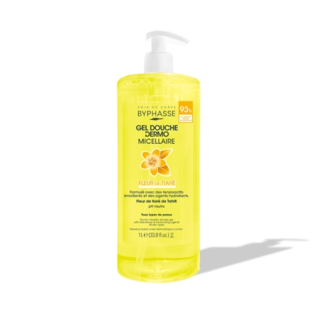 Un flacon pompe transparent de Byphasse Gel Douche Dermo Micellaire FLEUR DE TIARÉ 1 Litre, contenant un liquide jaune et comportant un graphique de fleur sur l'étiquette, se trouve sur un fond blanc avec une ombre douce. Dakar