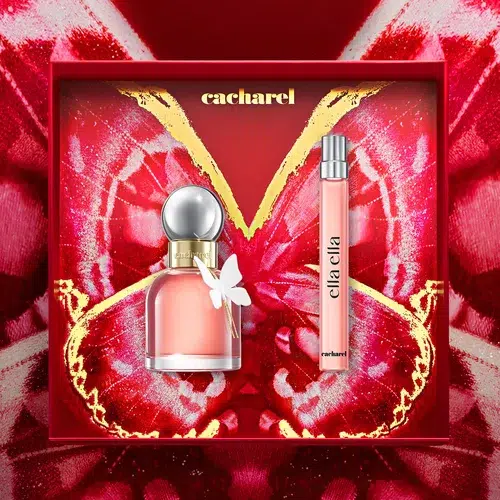 Le coffret cadeau du parfum "Ella" de Cacharel, dans un emballage rouge aux accents dorés sur le thème des papillons, comprend un flacon, un vaporisateur de voyage et une touche de NYX Professional Makeup Matte Bronzer Dark Tan 04 (9,5 g). Un petit papillon blanc orne le flacon. Dakar