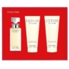 Le coffret cadeau pour Femme Calvin Klein Eternity, un coffret rouge, comprend un flacon d'eau de parfum et deux tubes luxueux de lotion pour le corps et de gel douche, tous mettant en valeur le nom emblématique de la marque. Dakar