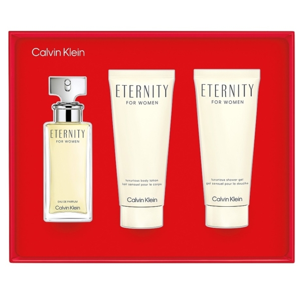 Le coffret cadeau pour Femme Calvin Klein Eternity, un coffret rouge, comprend un flacon d'eau de parfum et deux tubes luxueux de lotion pour le corps et de gel douche, tous mettant en valeur le nom emblématique de la marque. Dakar