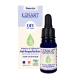 Un flacon compte-gouttes en verre bleu étiqueté "Christian Lenart Booster Anti Imperfections à l'Acide Salicylique 10 ml" se trouve devant sa boîte assortie avec un motif de feuilles vertes. Associez-le à Christian Lenart Brume Minérale pour une routine rafraîchie et certifiée COSMOS. Dakar