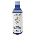 Un flacon en plastique bleu de Christian Lénart Hydrolat de Rose de Damas 200 ml avec une étiquette blanche comportant une illustration de rose rose, des textes en français et en anglais, et des logos de certification biologique. Dakar