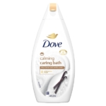 Le flacon blanc de 450 ml de DOVE Crème douche & huile contient du beurre de karité et un parfum de vanille. L'étiquette affiche le logo DOVE, une icône de colombe dorée et des images de gousses de vanille. Dakar