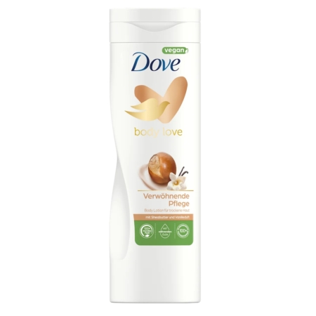 Un flacon blanc de Dove Shea Butter Lotion De Corps Beurre De Karité 400ml avec un parfum de vanille. L'étiquette comporte un cœur en or, des icônes "vegan" et "eco-friendly", ainsi qu'un texte en allemand décrivant cette lotion corporelle nourrissante. Dakar