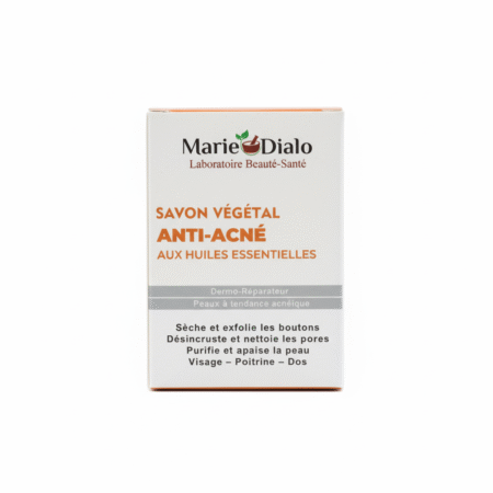 Une boîte de 150g de Dr Marie Diallo Laboratoires Savon Végétal Anti Acné, pour l'acné et les points noirs. L'emballage blanc avec un texte en français orange et gris met en valeur ses propriétés purifiantes et apaisantes pour le visage, le décolleté et le dos. Dakar