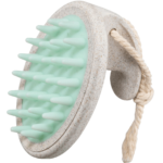 Une Brosse Ebelin pour Cuir Chevelu 1 pièce avec des poils en silicone souple et une poignée en boucle de corde
