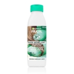 Flacon blanc de 400 ml de Garnier Fructis Après Shampooing Hair Food Aloe Vera pour cheveux normaux à secs, avec des graphismes verts et naturels sur l'étiquette. Dakar