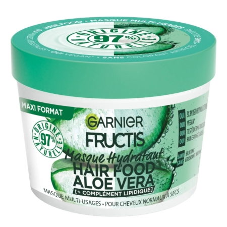 Un pot de 390 ml de Garnier Fructis Hair Food Masque Multi Usages à l'Aloe Vera avec un couvercle vert, étiqueté en français et en anglais, met l'accent sur sa formule végétalienne et ses 97% d'ingrédients d'origine naturelle. Dakar