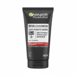 Un tube noir de GARNIER Pure Active Nettoyant 3 en 1 au charbon Anti-Points Noirs Incrustés 150ml avec un texte en français, des accents rouges, blancs et verts ; étiqueté vegan et testé dermatologiquement. Dakar