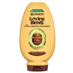 Un flacon jaune de 250 ml de Garnier Ultra Doux Après-shampooing à l'huile d'avocat et beurre de karité, conçu pour les cheveux secs, rêches ou frisés, avec des accents verts et bruns sur l'étiquette. Dakar
