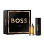 Le coffret Hugo Boss BOSS The Scent Coffret Cadeau pour Homme se présente sous la forme d'une élégante boîte noire et dorée, avec un flacon de parfum et un spray déodorant assorti disposés devant le coffret. Dakar
