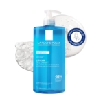 Un grand flacon bleu de 1L de LA ROCHE-POSAY LIPIKAR Gel Lavant avec une pompe, présenté devant une texture gel claire et un badge rond indiquant "Recommandé par 90,000 dermatologistes". Dakar