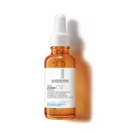 Un flacon compte-gouttes de 30 ml de sérum La Roche Posay Pure Vitamine C, avec une étiquette blanche et un bouchon compte-gouttes, se tient debout sur un fond blanc. Dakar