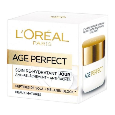 L'Oréal Crème Visage Jour Anti-Âge Raffermissant Age Perfect 50 ml pour les peaux matures offre des avantages anti-affaissement et anti-taches grâce aux peptides de soja et au blocage de la mélanine, dans un emballage principalement blanc et or. Dakar