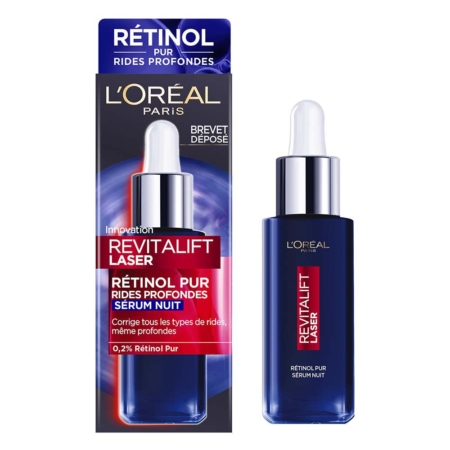 Un flacon de 30 ml de L'Oréal Sérum de Nuit au Rétinol Pur Revitalift Laser avec compte-gouttes se trouve à côté de son emballage français, mettant en valeur le rétinol pur à 0,2 % pour cibler les rides profondes. Dakar