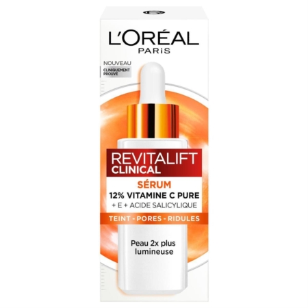 L'Oréal Serum Revitalift Clinical Vitamin C 30 ml contient 12% de vitamine C pure, de la vitamine E et de l'acide salicylique pour une peau plus lumineuse avec des pores et des rides réduits. Présenté dans une boîte blanche et orange avec un flacon compte-gouttes. Dakar