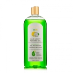 Un flacon de 500 ml de Makari Bébé Gel Moussant Cheveux et Corps à la Noix de Coco & Panthénol dans un liquide vert et un bouchon doré
