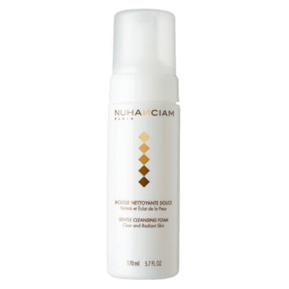 Flacon blanc de Nuhanciam Mousse Nettoyante Netteté et Éclat de la Peau Douce 170 ml aux accents dorés